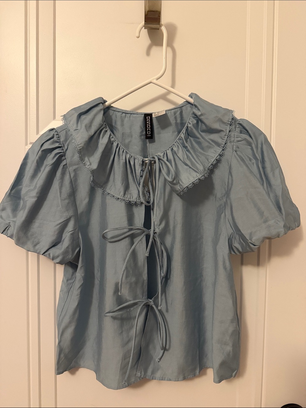 Divided Light Blue Ruffle Tie-Front Blouse